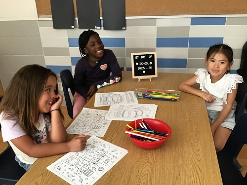 School age children working as a group