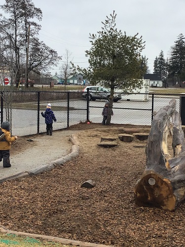 Children running around the playground