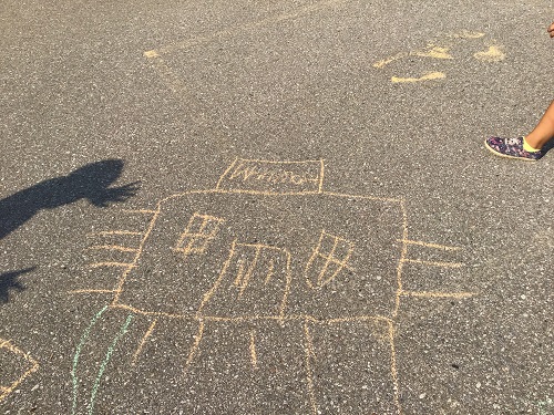 Chalk drawings on the pavement outside