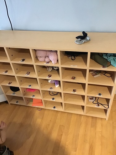 The indoor cubby shelf.