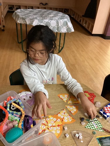school-age girl playing Pizza Party