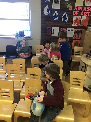 Group of preschool on pretend pirate ship