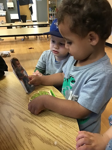 toddler boys playing with personalized block people