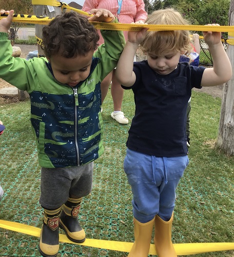 2 toddler boys on ratchet straps