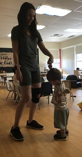 Educator and child forming a bond together