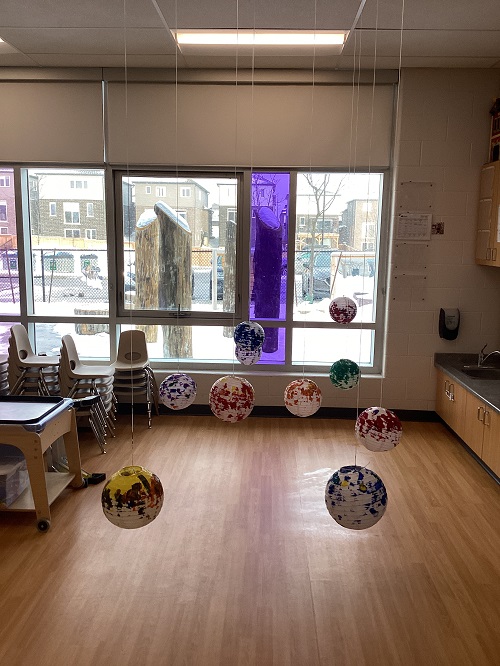Painted lanterns suspended from the ceiling.