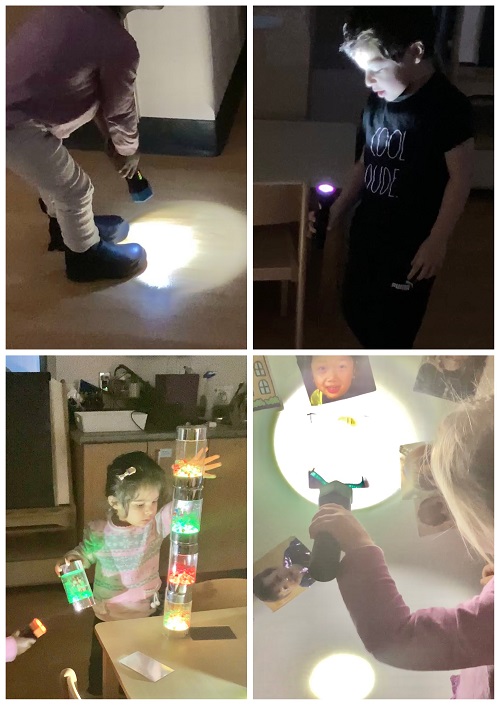 Children using flashlights to observe different items and materials.