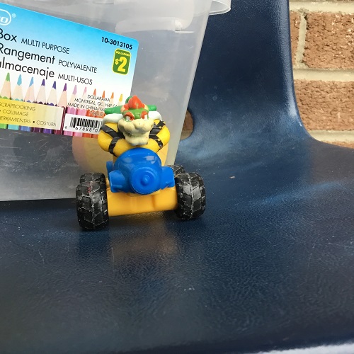 Photo of the Bowser character from Mario on a bike