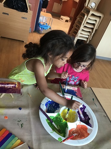 Children painting Father's day gifts