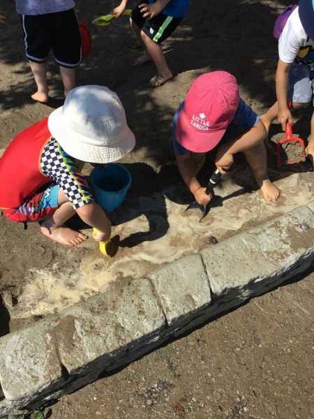 children playing in mud