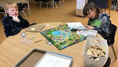 two children playing the game of life