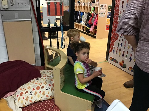 2 children drinking hot chocolate