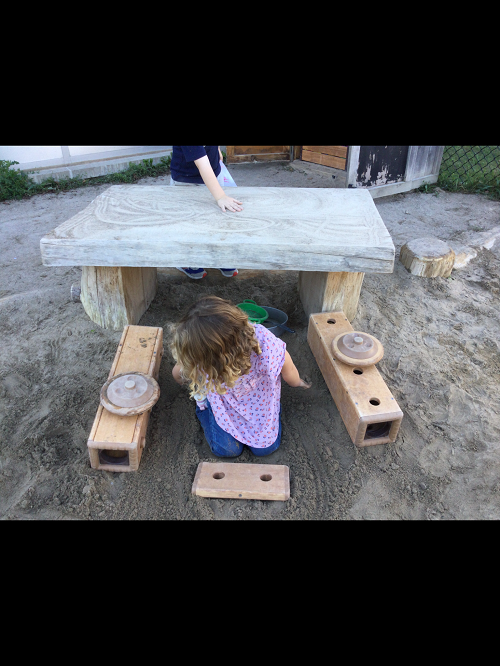 child under table