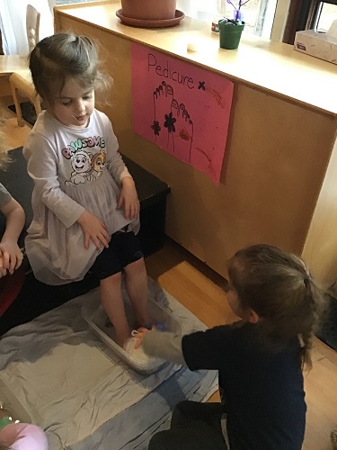 spad day - children washing feet