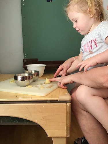 child helps during activity