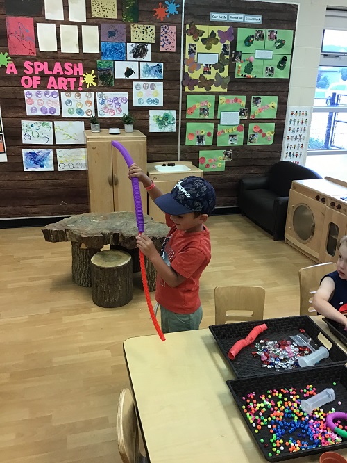 Preschool boy exploring the tubes