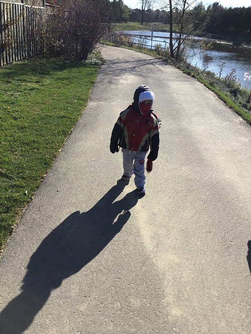 Preschool child walking on the path