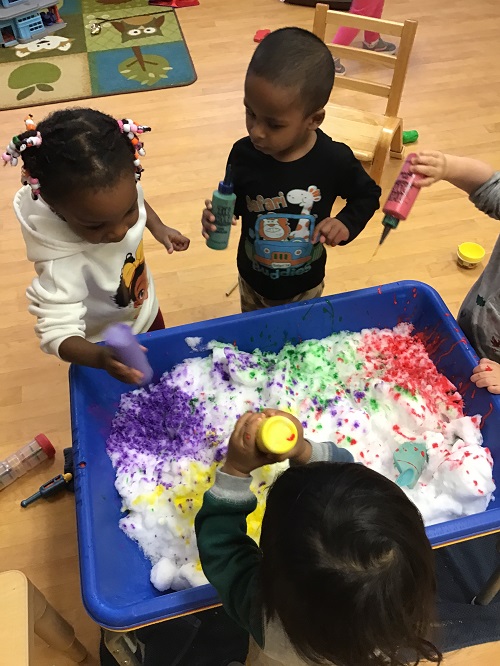 Children colouring snow