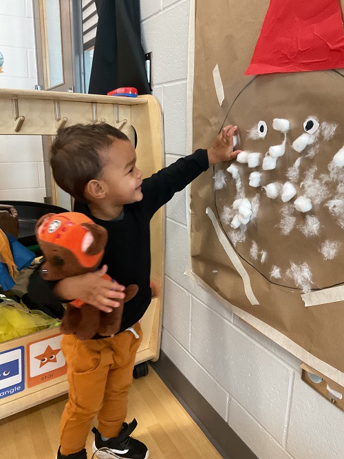 little boy cottonballs and santa